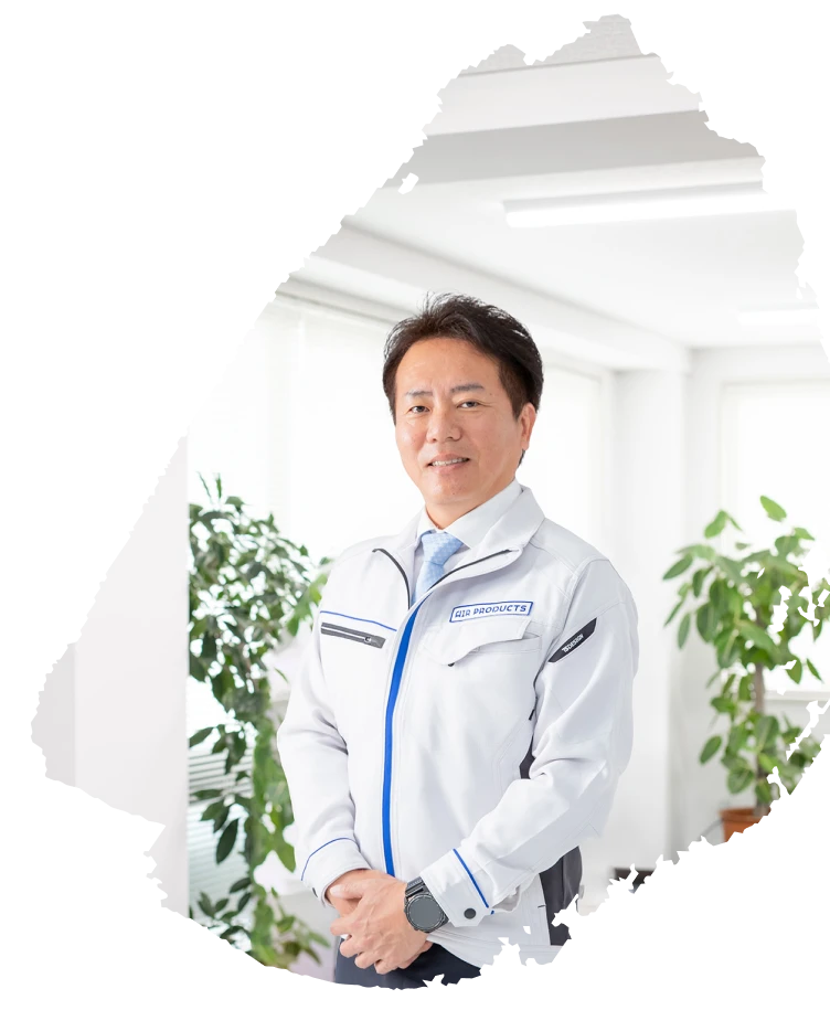 社長が後輩を指導している様子